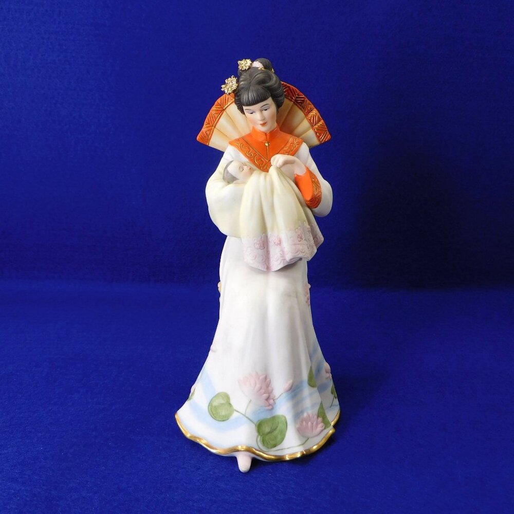 Asian Woman with Baby Kuan-Yin "Goddesses of China." Collection Ashton Drake